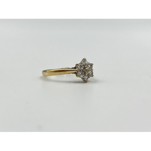 2021 - A hallmarked Birmingham 9ct gold CZ floral cluster ring, size Q - approx. gross weight 2.7g