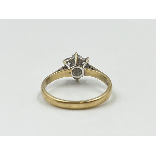 2021 - A hallmarked Birmingham 9ct gold CZ floral cluster ring, size Q - approx. gross weight 2.7g