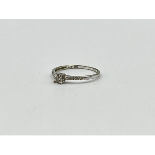 2024 - A 9ct white gold 0.15ct diamond ring, size N½ - approx. gross weight 1.13g