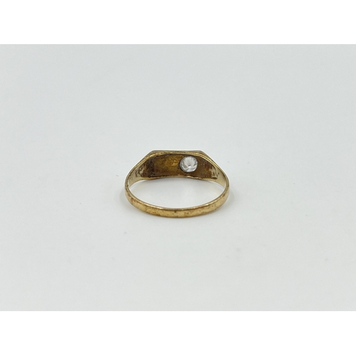 2026 - A hallmarked London 9ct gold CZ set signet ring, size N½ - approx. gross weight 1.3g