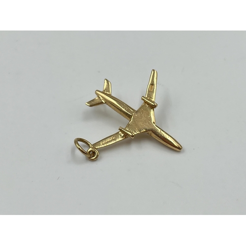 2027 - A hallmarked Birmingham 9ct gold aeroplane pendant - approx. gross weight 2.8g