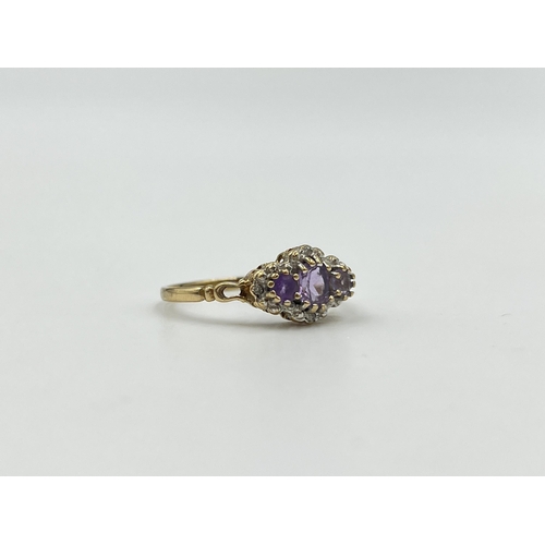 2029 - A hallmarked Birmingham 9ct gold amethyst and diamond trilogy ring, size Q - approx. gross weight 1.... 