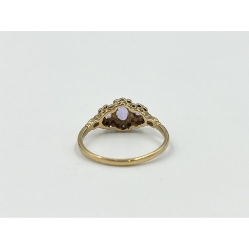 2029 - A hallmarked Birmingham 9ct gold amethyst and diamond trilogy ring, size Q - approx. gross weight 1.... 