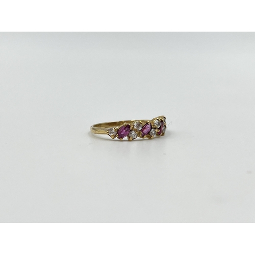 2031 - A 9ct gold ruby and CZ dress ring, size L - approx. gross weight 1.4g