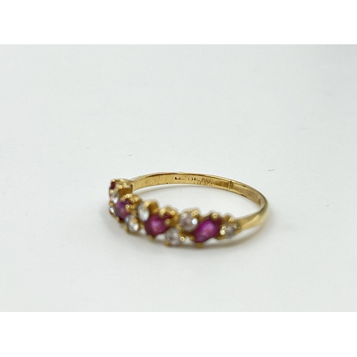 2031 - A 9ct gold ruby and CZ dress ring, size L - approx. gross weight 1.4g