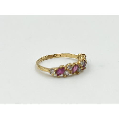 2031 - A 9ct gold ruby and CZ dress ring, size L - approx. gross weight 1.4g