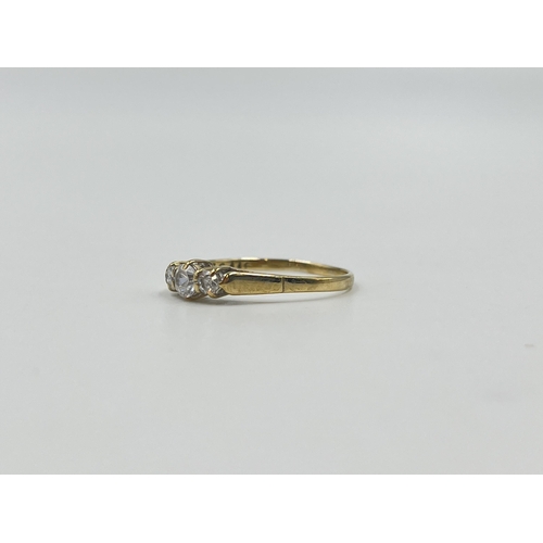 2032 - A hallmarked Birmingham 9ct gold CZ trilogy ring, size R - approx. gross weight 1.4g