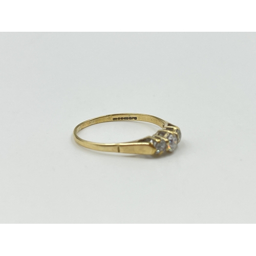 2032 - A hallmarked Birmingham 9ct gold CZ trilogy ring, size R - approx. gross weight 1.4g