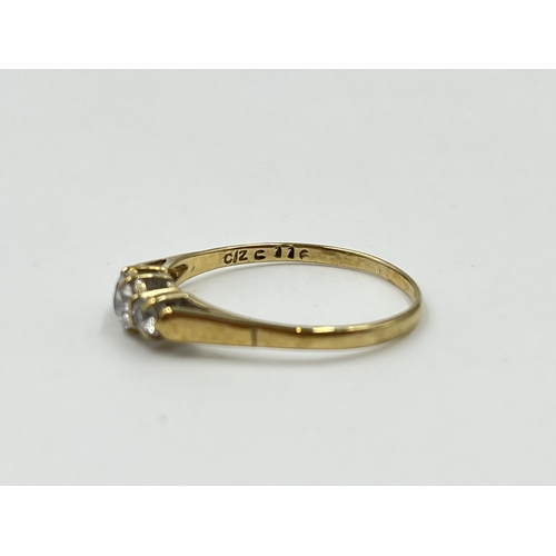 2032 - A hallmarked Birmingham 9ct gold CZ trilogy ring, size R - approx. gross weight 1.4g