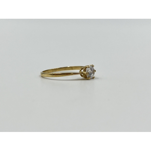 2036 - A 9ct gold CZ solitaire ring, size M½ - approx. gross weight 1.09g