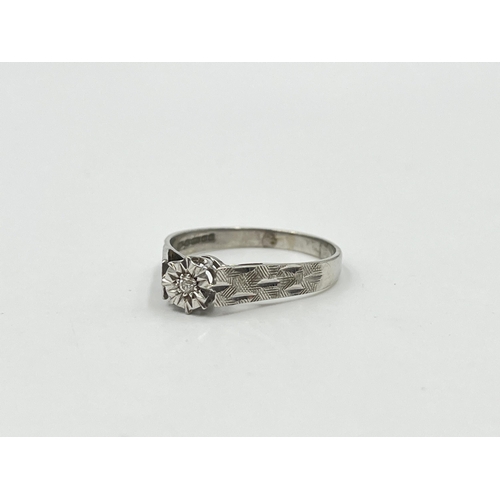 2041 - A hallmarked Birmingham 9ct white gold diamond solitaire ring, size U - approx. gross weight 3g