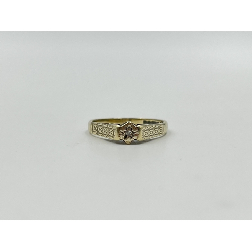 2042 - A hallmarked 9ct gold diamond solitaire ring, size M - approx. gross weight 2g