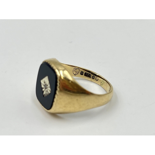 2052 - A hallmarked London 9ct gold black onyx and diamond set signet ring, size O - approx. gross weight 4... 