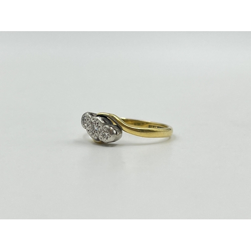 2060 - An 18ct gold and platinum diamond bypass ring, size M - approx. gross weight 2.3g