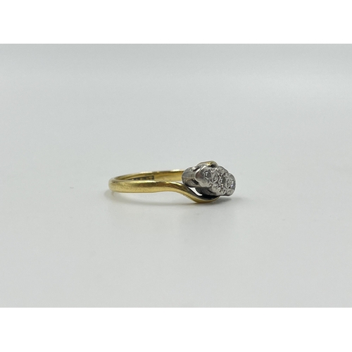 2060 - An 18ct gold and platinum diamond bypass ring, size M - approx. gross weight 2.3g