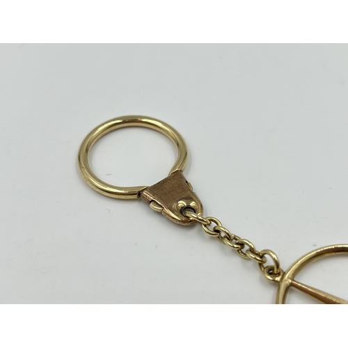 2063 - A hallmarked Birmingham 9ct gold Mercedes key ring - approx. gross weight 9.6g