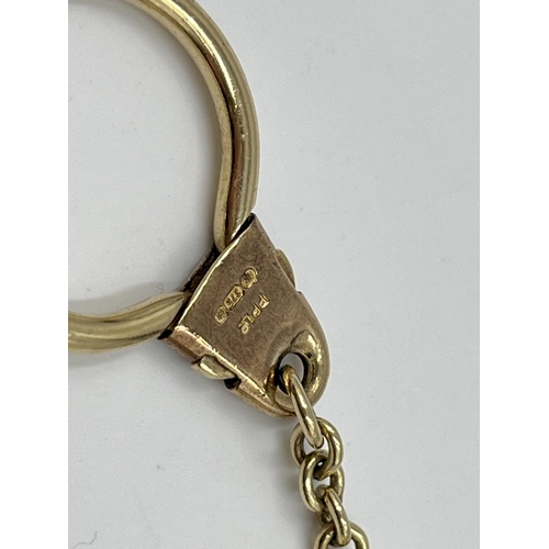 2063 - A hallmarked Birmingham 9ct gold Mercedes key ring - approx. gross weight 9.6g