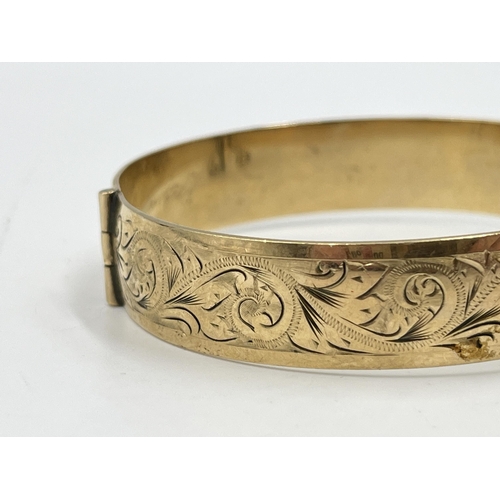 2074 - A vintage H.G & S 9ct rolled gold floral etched bangle - approx. gross weight 28g