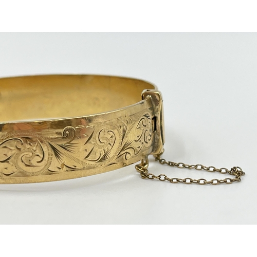 2074 - A vintage H.G & S 9ct rolled gold floral etched bangle - approx. gross weight 28g