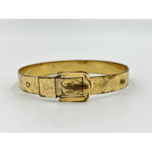 2075 - A vintage Excalibur 12ct rolled gold floral etched belt buckle bangle - approx. gross weight 16g