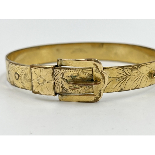 2075 - A vintage Excalibur 12ct rolled gold floral etched belt buckle bangle - approx. gross weight 16g