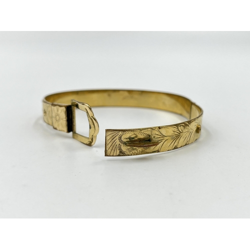 2075 - A vintage Excalibur 12ct rolled gold floral etched belt buckle bangle - approx. gross weight 16g