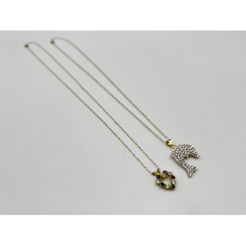 2078 - Two 9ct gold pendant necklaces, one sapphire and CZ and one CZ set dolphin - approx. gross weight 2.... 