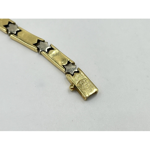 2082 - A stamped 14ct gold star motif bracelet - approx. gross weight 13.4g