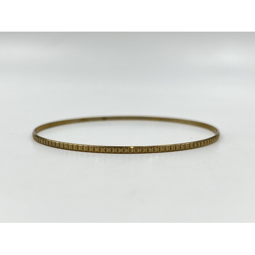 2084 - A stamped 8ct gold bangle - approx. gross weight 3.45g