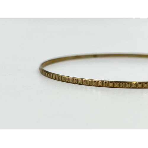 2084 - A stamped 8ct gold bangle - approx. gross weight 3.45g