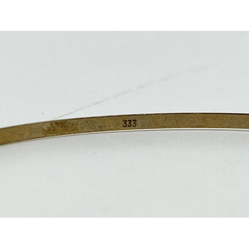 2084 - A stamped 8ct gold bangle - approx. gross weight 3.45g