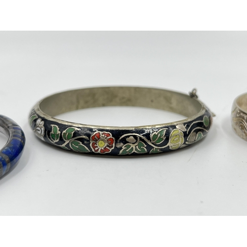 2090 - Four silver bracelets and bangles to include Siam sterling and enamel, lapis lazuli etc. - approx. g... 