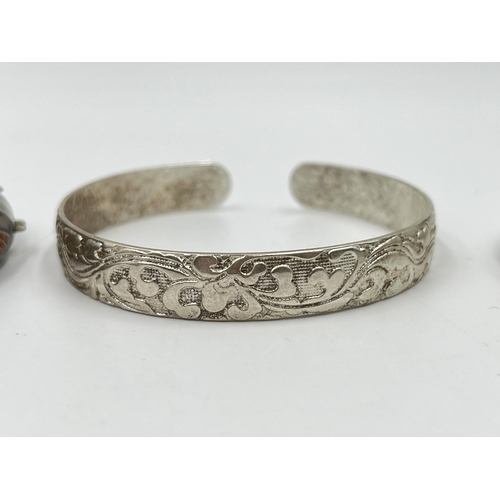 2090 - Four silver bracelets and bangles to include Siam sterling and enamel, lapis lazuli etc. - approx. g... 