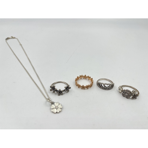 2094 - Five pieces of Pandora .925 silver jewellery, four rings and one pendant necklace - approx. gross we... 