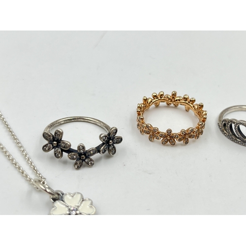 2094 - Five pieces of Pandora .925 silver jewellery, four rings and one pendant necklace - approx. gross we... 