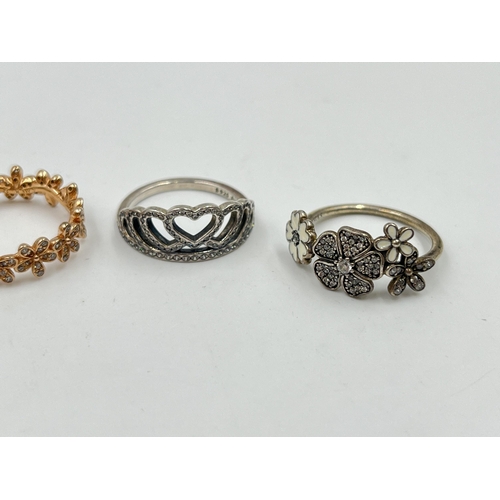 2094 - Five pieces of Pandora .925 silver jewellery, four rings and one pendant necklace - approx. gross we... 