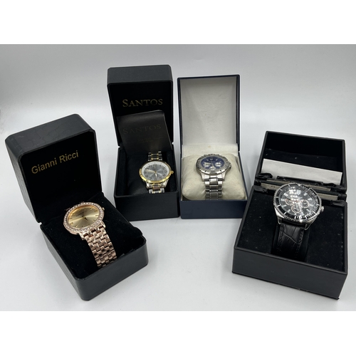 2185 - Four boxed quartz wristwatches to include Sekonda, Santos etc.