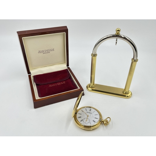 2187 - A boxed Jean Pierre 9ct gold cased full hunter hand wind pocket watch with a chromium plated and gil... 