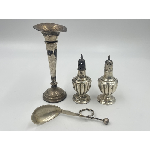 2193 - Four pieces of hallmarked silver, one Scandinavian J.M. .830 spoon, two Chester pepper shakers and o... 