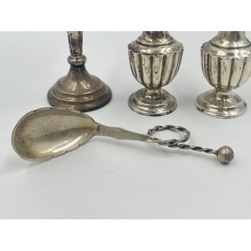 2193 - Four pieces of hallmarked silver, one Scandinavian J.M. .830 spoon, two Chester pepper shakers and o... 