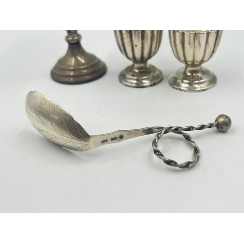 2193 - Four pieces of hallmarked silver, one Scandinavian J.M. .830 spoon, two Chester pepper shakers and o... 