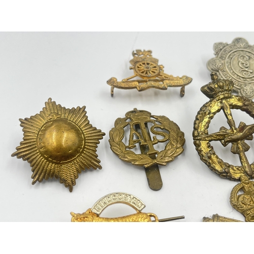 2240 - Ten military cap badges to include Royal Scots Greys Waterloo, Auxiliary Territorial Service, Southe... 