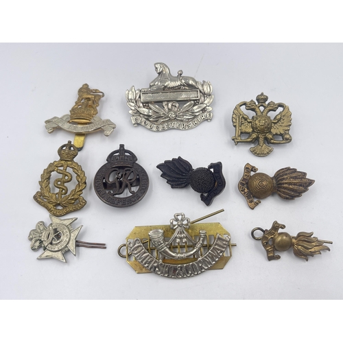 2241 - Ten military cap badges to include Somerset & Cornwall, Gloucestershire, National Defence Company, R... 