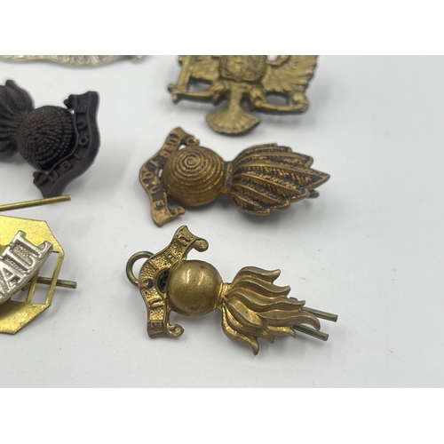 2241 - Ten military cap badges to include Somerset & Cornwall, Gloucestershire, National Defence Company, R... 