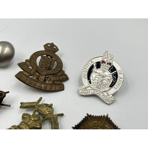 2242 - Ten military cap badges to include Winnipeg Light Infantry, Army Legal Corps, The Royal Sussex Regim... 