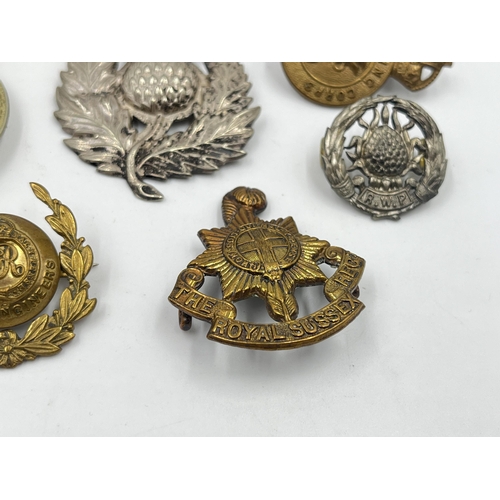 2243 - Ten military cap badges to include The Royal Sussex Regiment, Glider Pilot Regiment, Royal Engineers... 