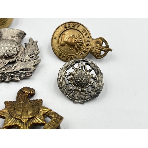 2243 - Ten military cap badges to include The Royal Sussex Regiment, Glider Pilot Regiment, Royal Engineers... 