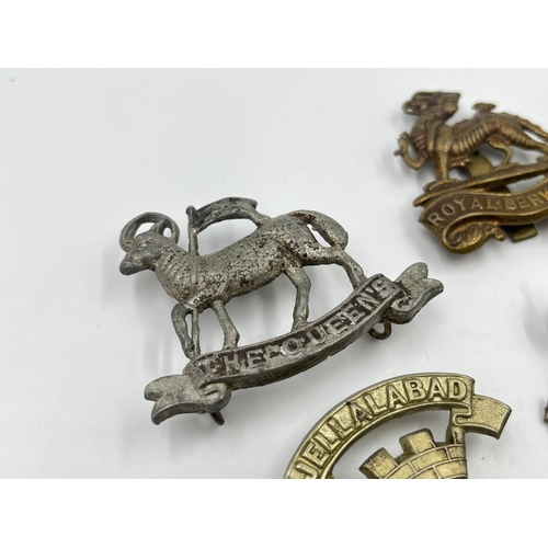 2244 - Ten military cap badges to include Royal Berkshire, Dorset, Jellalabad, South Staffordshire, East La... 