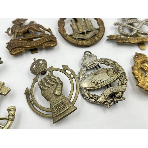 2244 - Ten military cap badges to include Royal Berkshire, Dorset, Jellalabad, South Staffordshire, East La... 