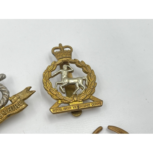 2244 - Ten military cap badges to include Royal Berkshire, Dorset, Jellalabad, South Staffordshire, East La... 